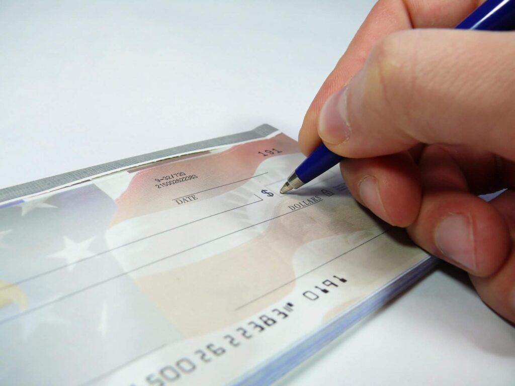 Spiritual significance of receiving a cheque in dreams